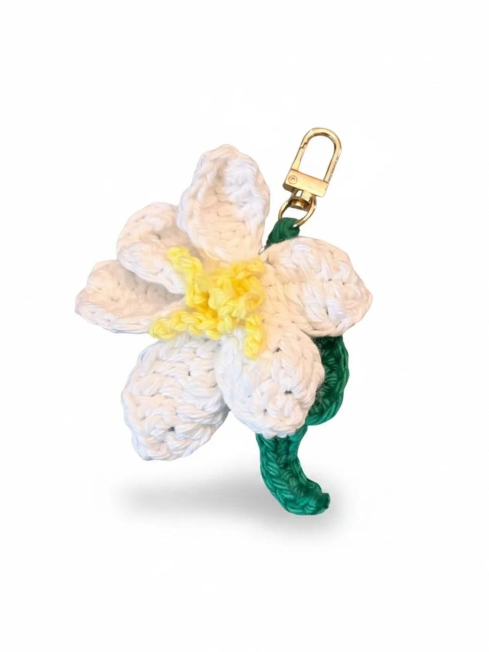 Crocheted White Flower Keychain with Green Leaf and Yellow Center